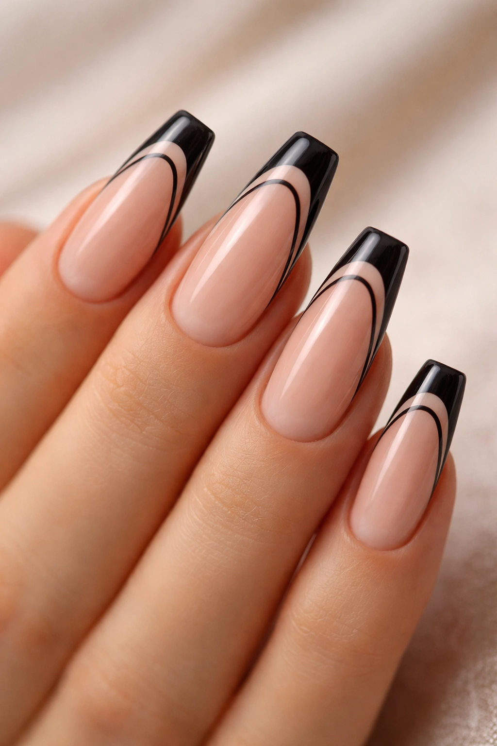 Double-line black French tips with a floating arc on ballerina nails