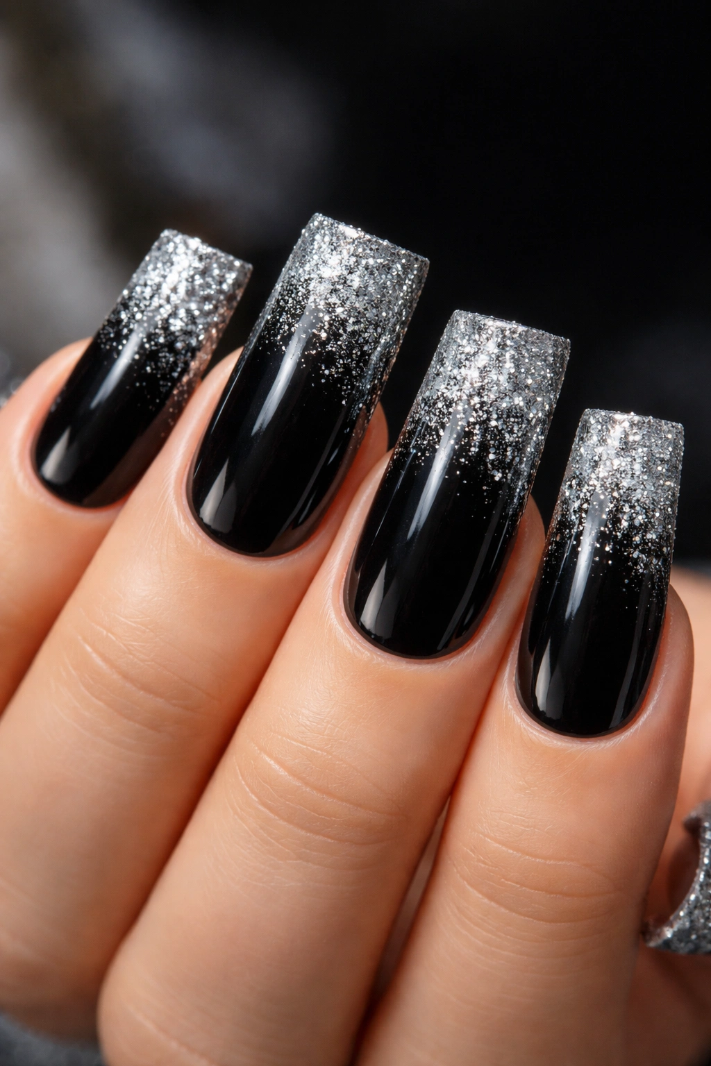 Duck nails with black base and silver glitter gradient