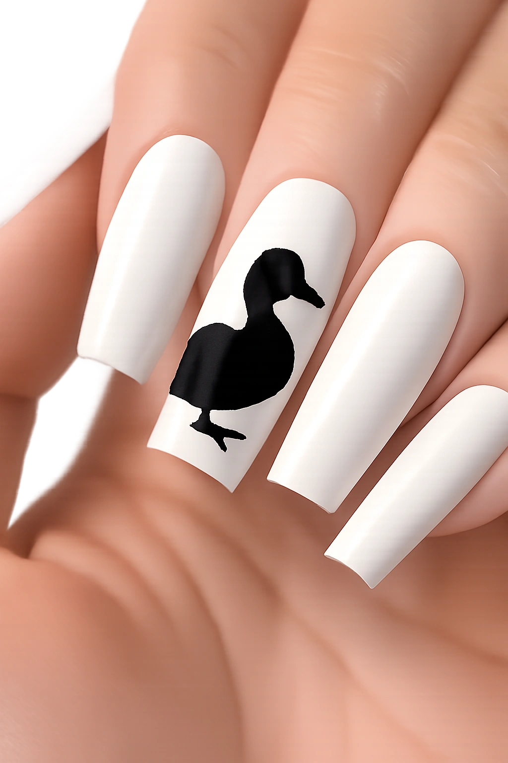 Black duck silhouette on white nail design