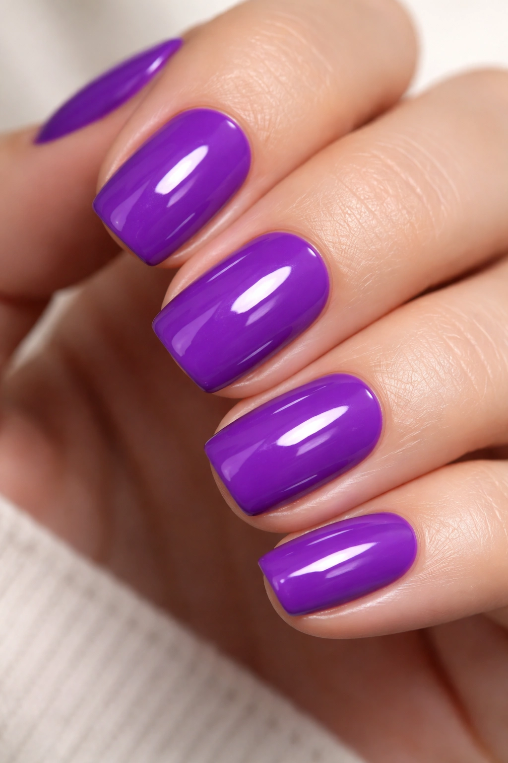 Electric purple squoval nails with glossy finish
