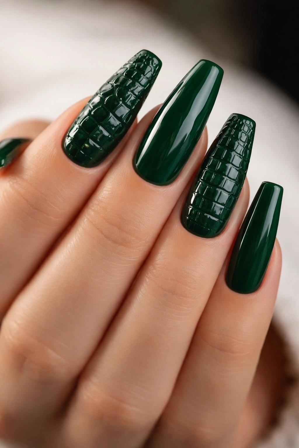 Emerald nails with croc-print accent on one or two nails