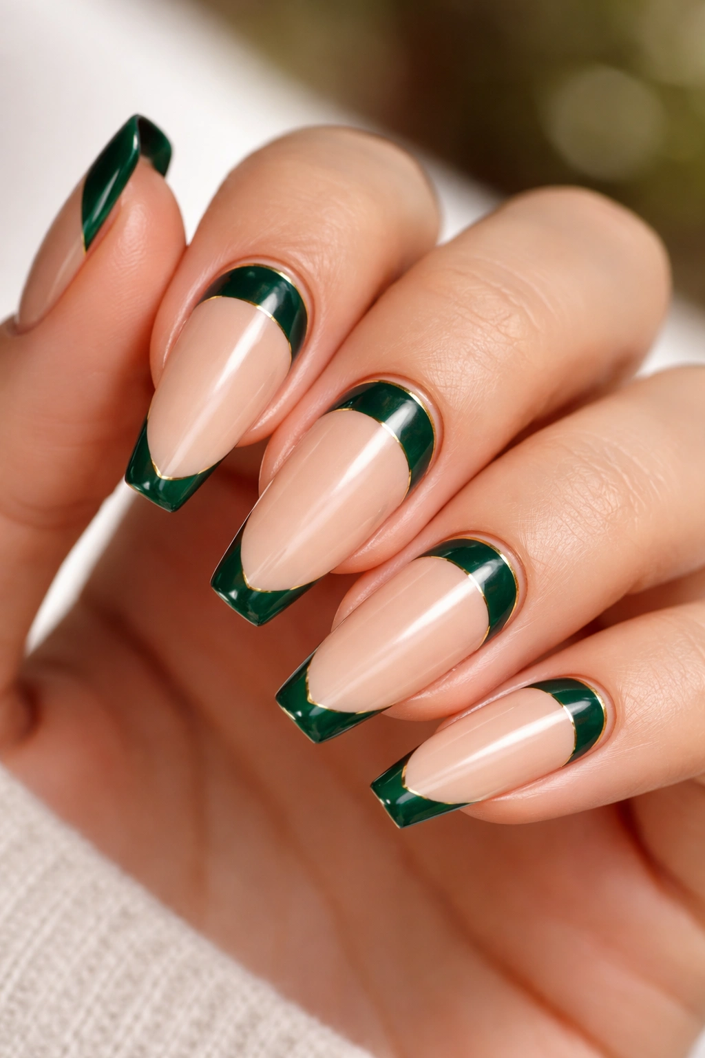 Emerald moon manicure with reverse French crescent near cuticle
