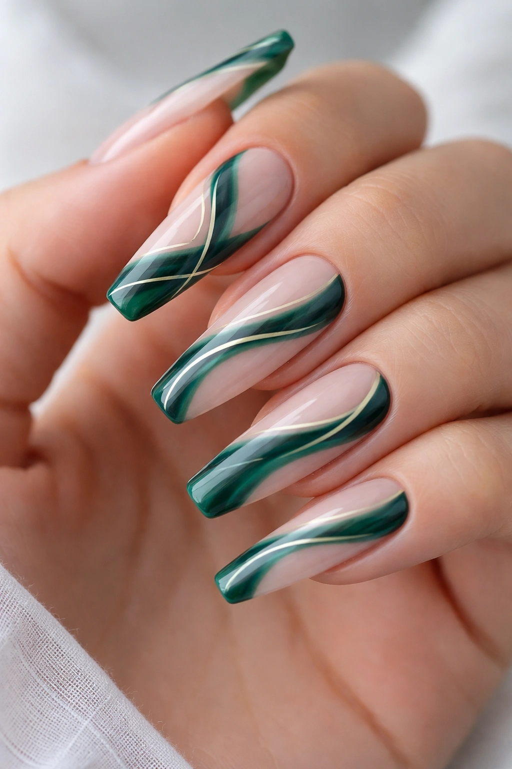Nude base with emerald swirls and negative space