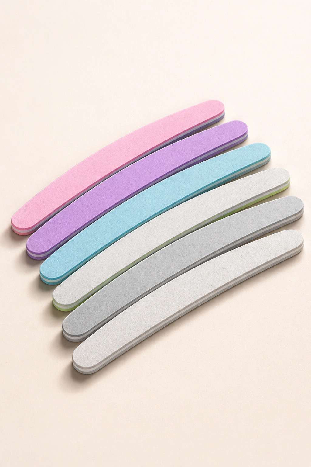 Six colorful emery boards arranged in a fan
