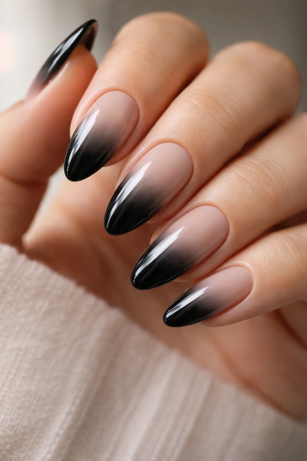 Pristine almond nails with clean cuticles and glossy top coat