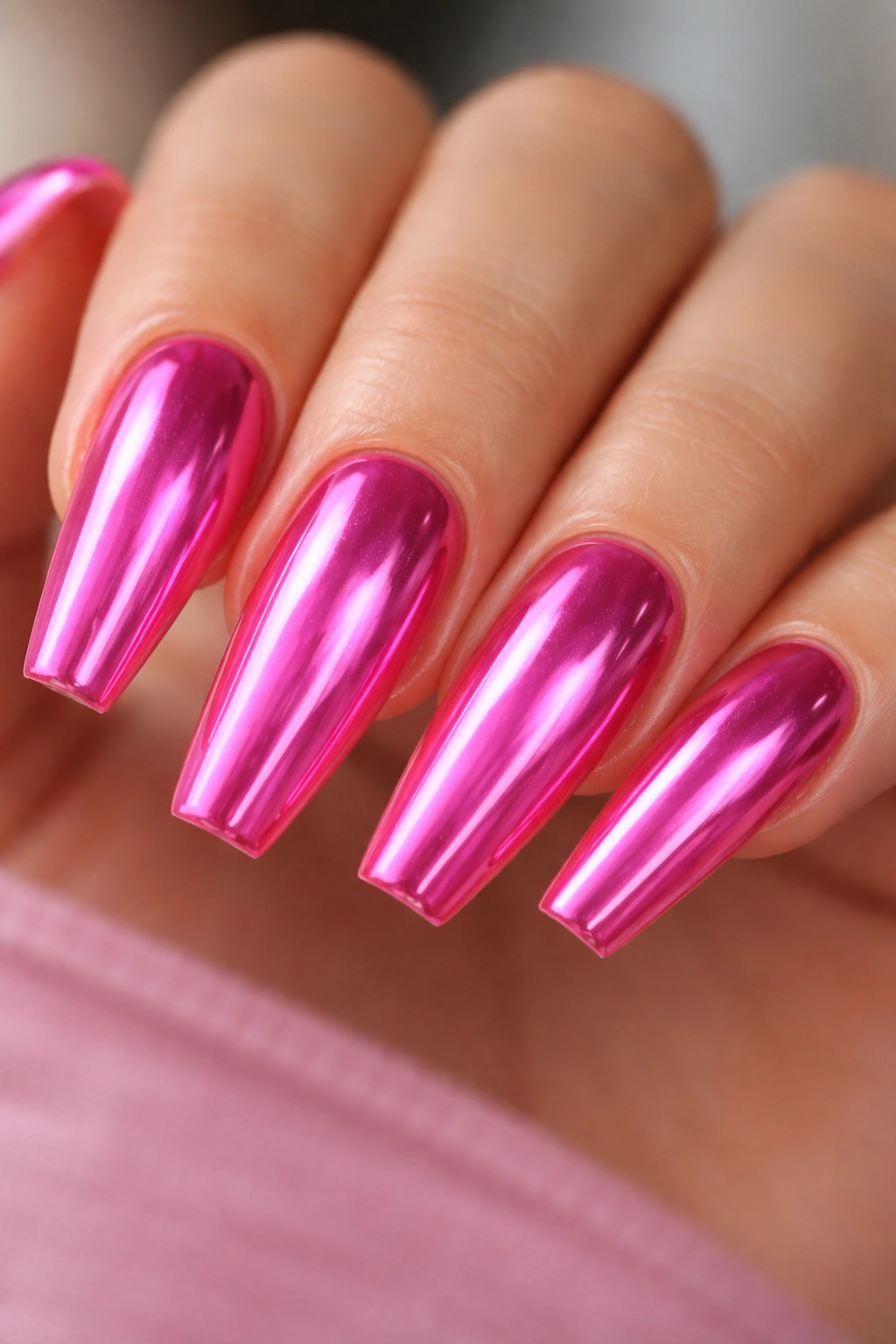 Fuchsia chrome overlay on bright pink ballerina nails.