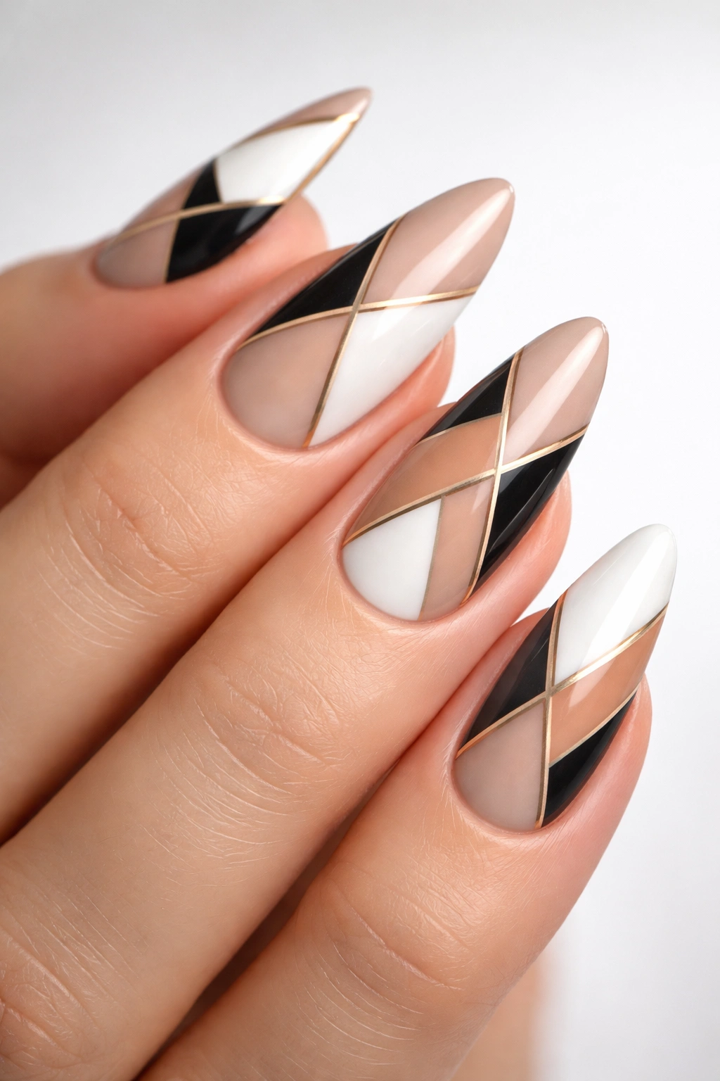 Geometric almond nails with lines triangles and negative space, close-up
