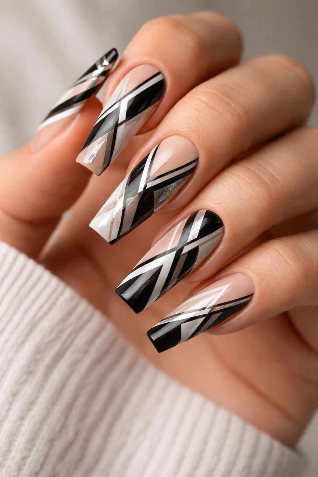 Coffin nails with sharp geometric patterns and shapes