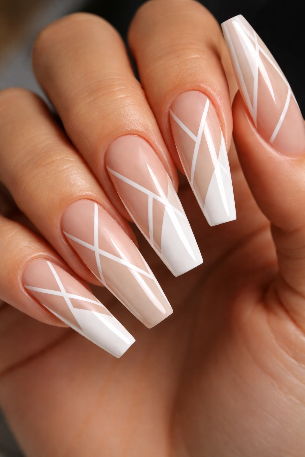 Close-up of coffin nails with geometric pattern and negative space