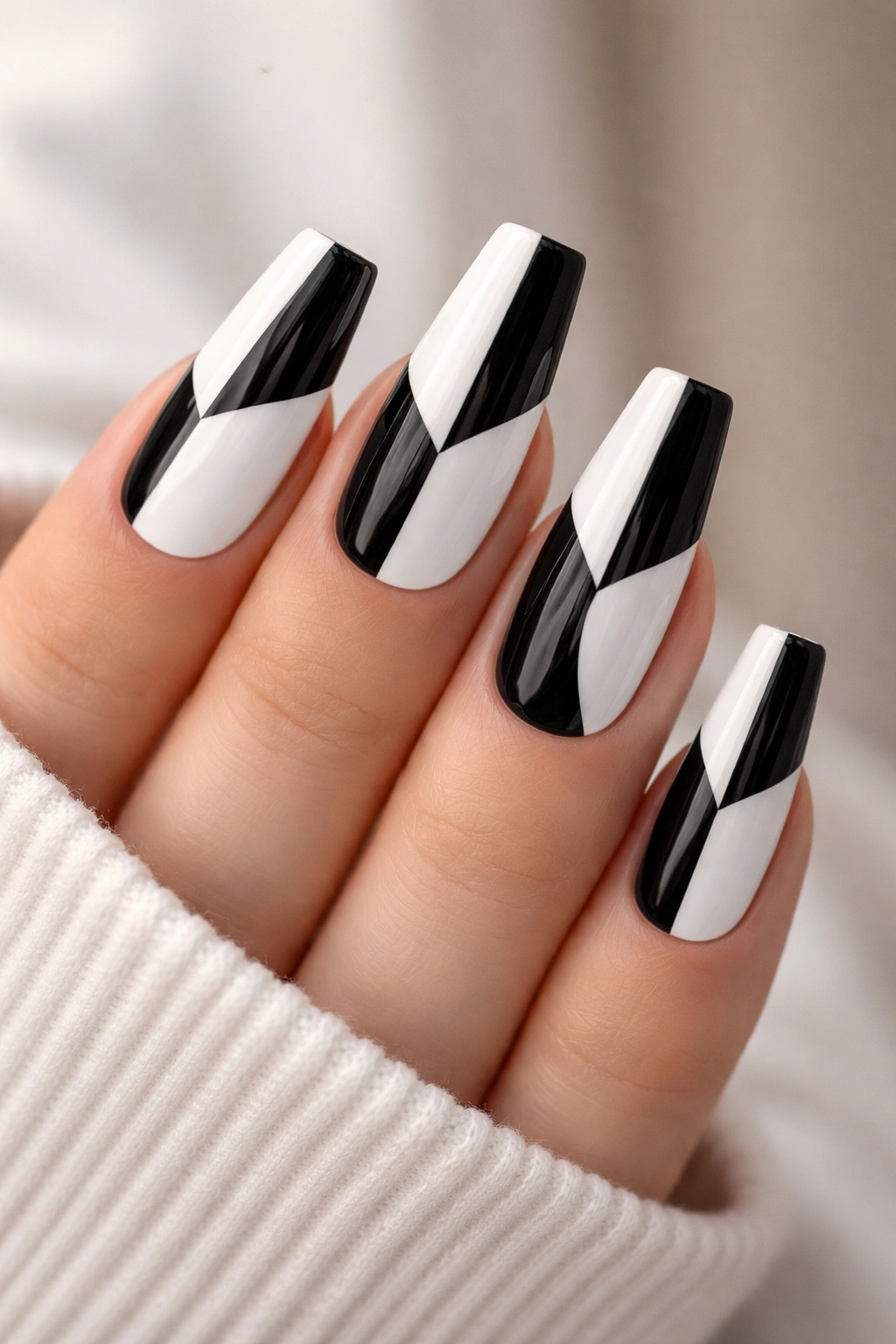 Coffin nails with bold black and white geometric colorblock design
