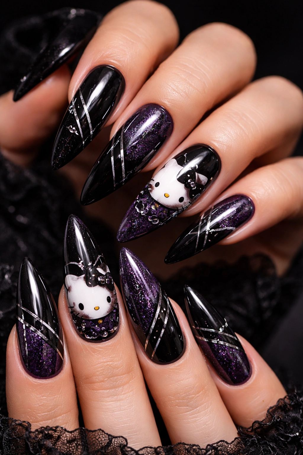 Gothic Hello Kitty nails with dark colors and white silhouette