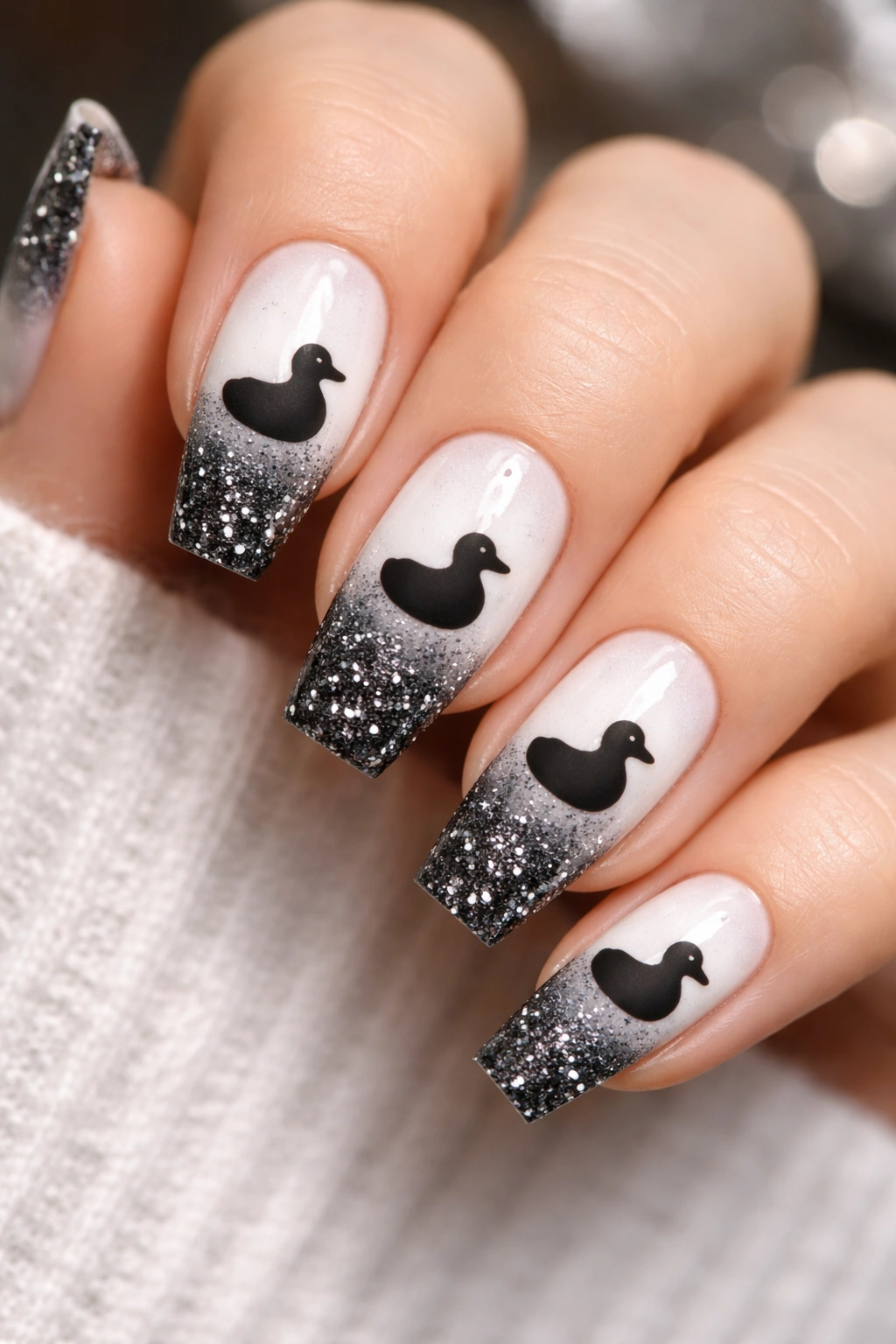 Gradient glitter duck nails with matte duck silhouette