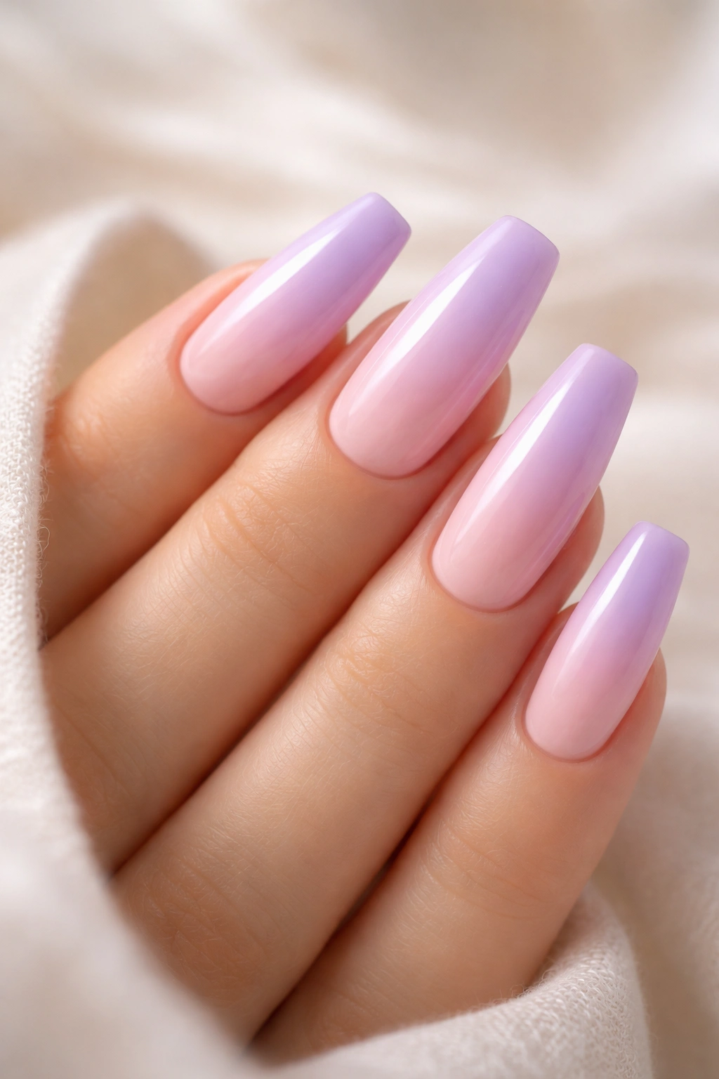 Coffin nails gradient from lavender to pale pink