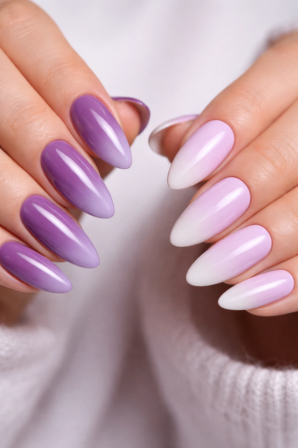 Almond nails with purple-to-lavender and lavender-to-white ombre, soft studio lighting
