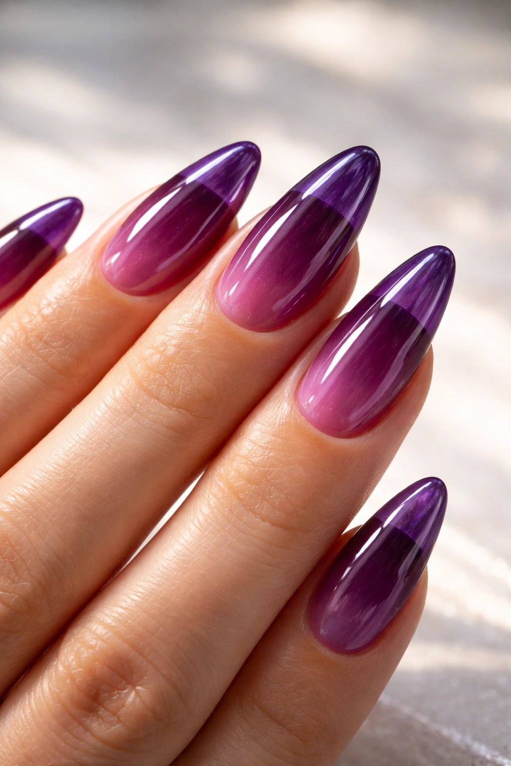 Grape jelly almond nails with translucent purple finish