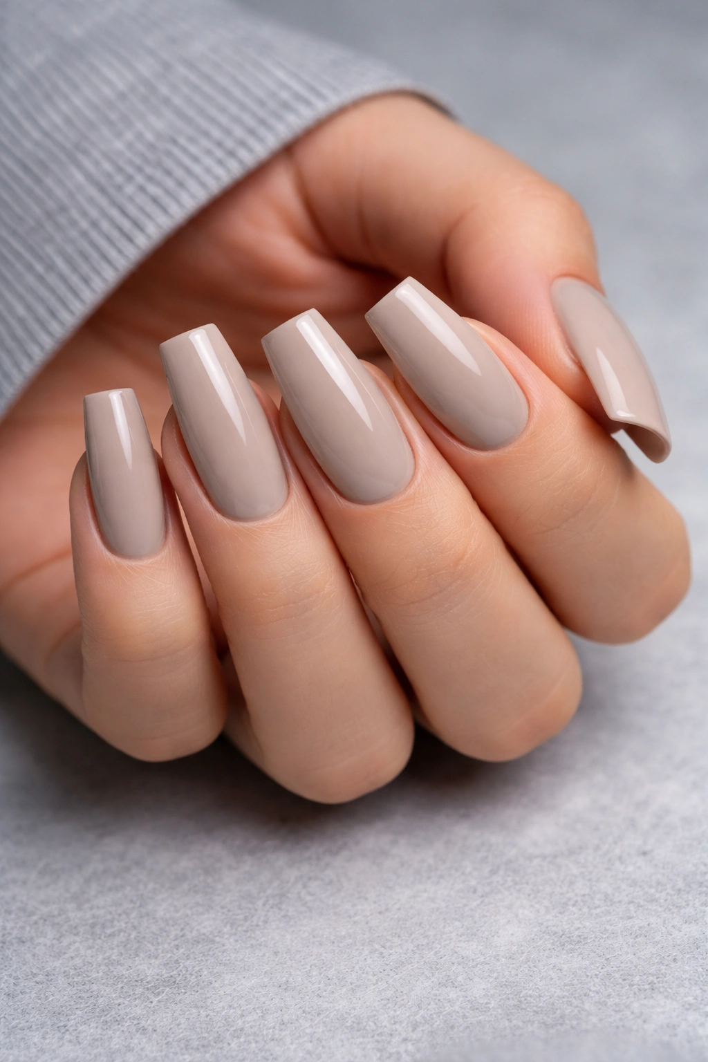 Greige nails with a crisp square finish
