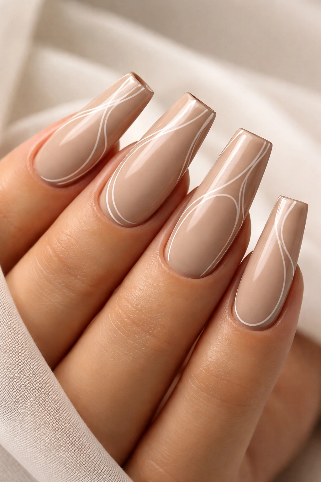 Greige nude duck nails with minimalist line art along the edges