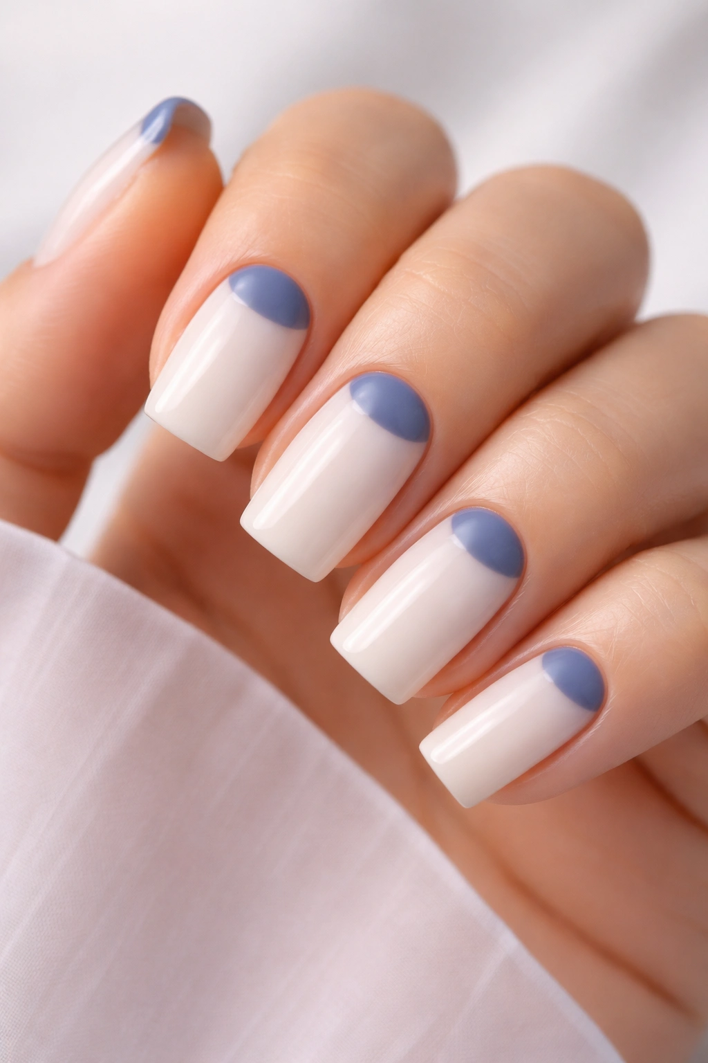 Close-up of Half-Moon Blueberry and Milk manicure on nails