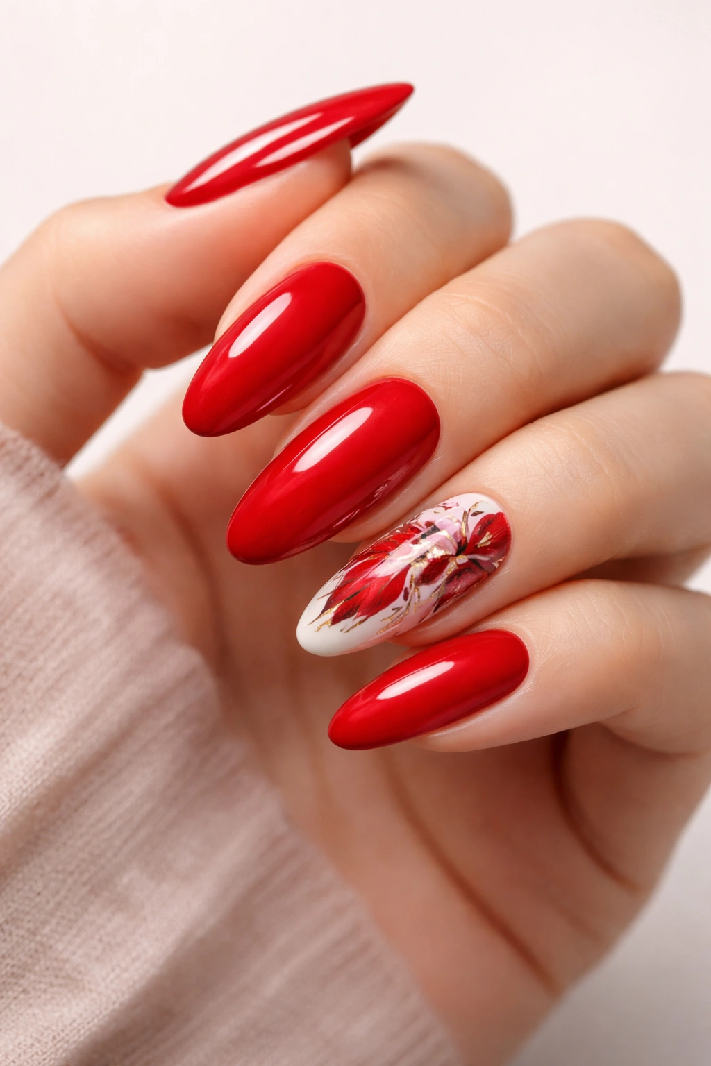 Close-up of long rounded nails with a hand-painted accent nail