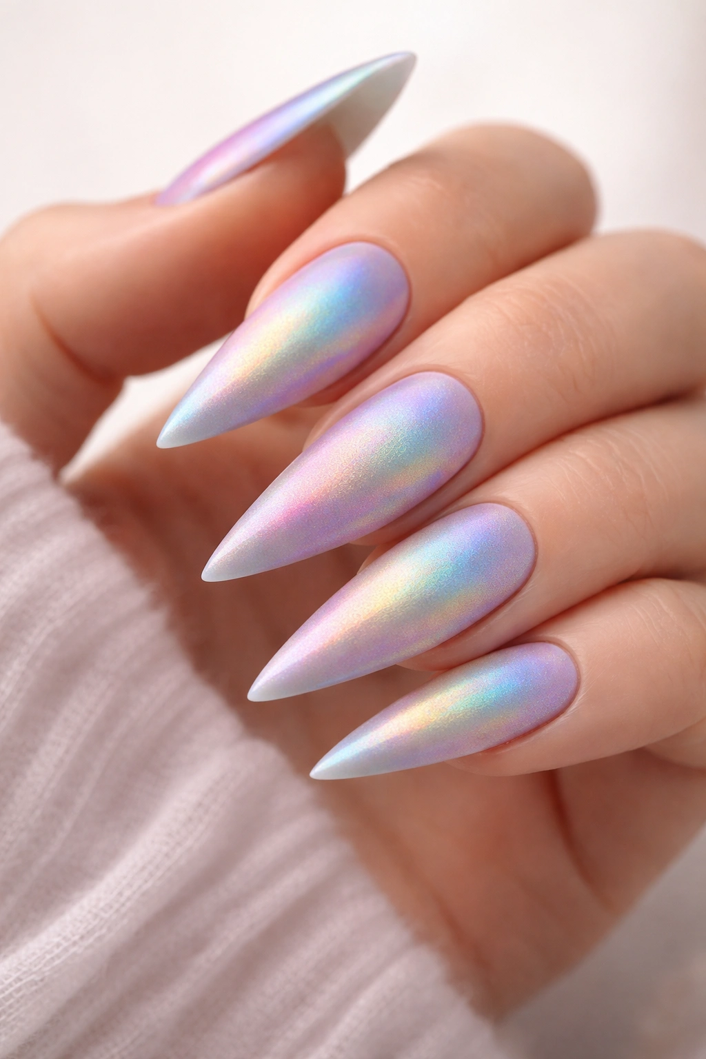 Holographic stilettos nails with matte finish