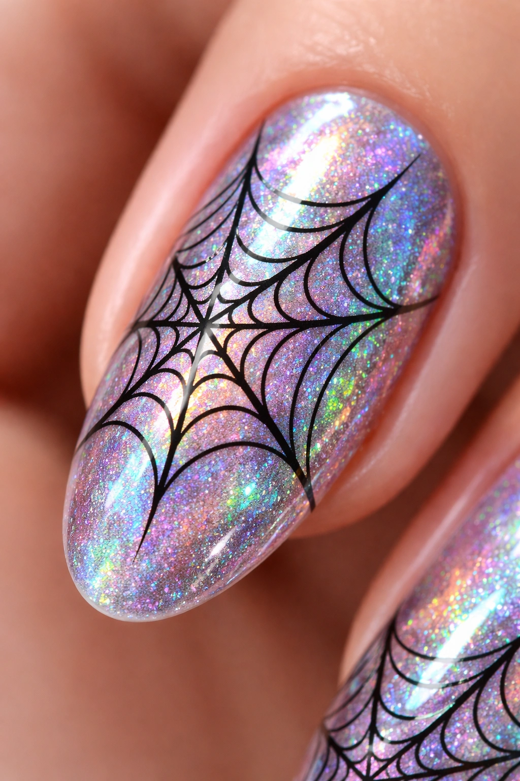 Nail with holographic base and black spiderweb detailing.