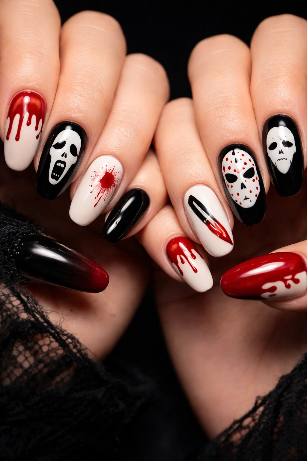Nails with minimalist horror icon silhouettes in black white red