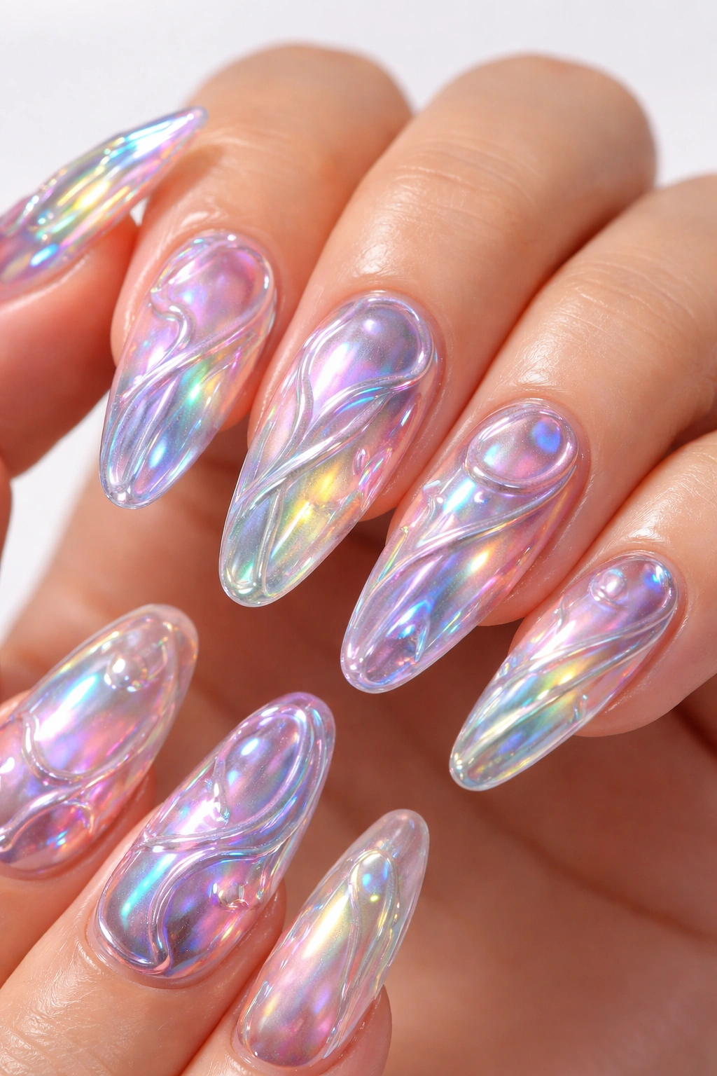Close-up of nails with iridescent 3D elements and color-shifting finishes