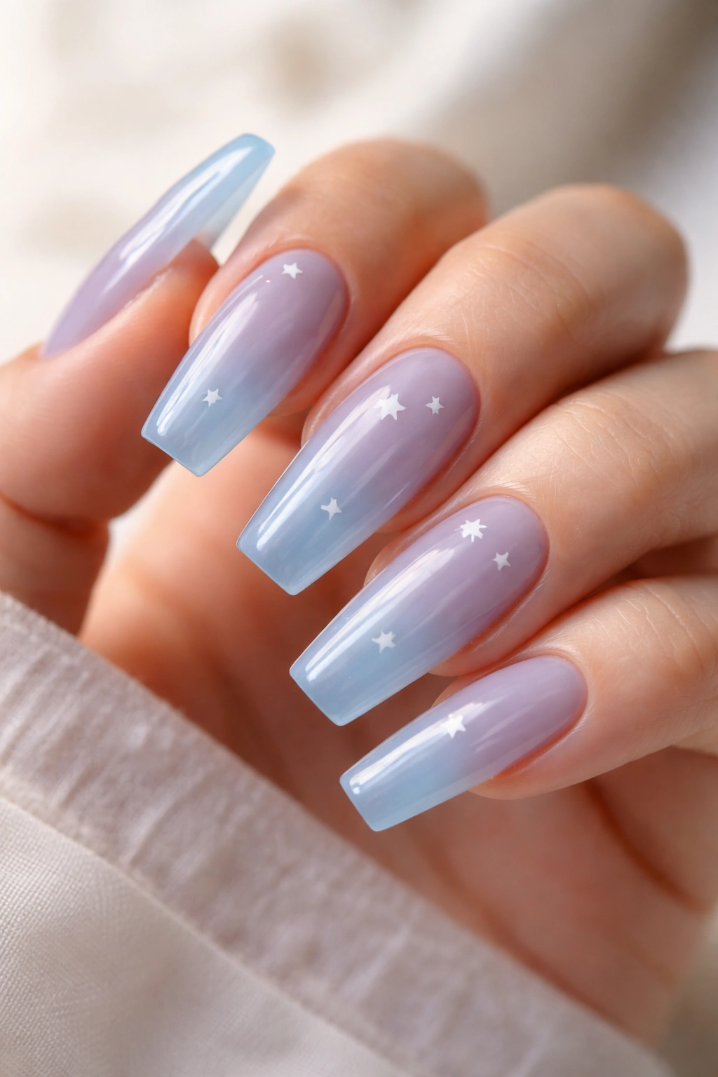 Jelly blue nails with white star decals
