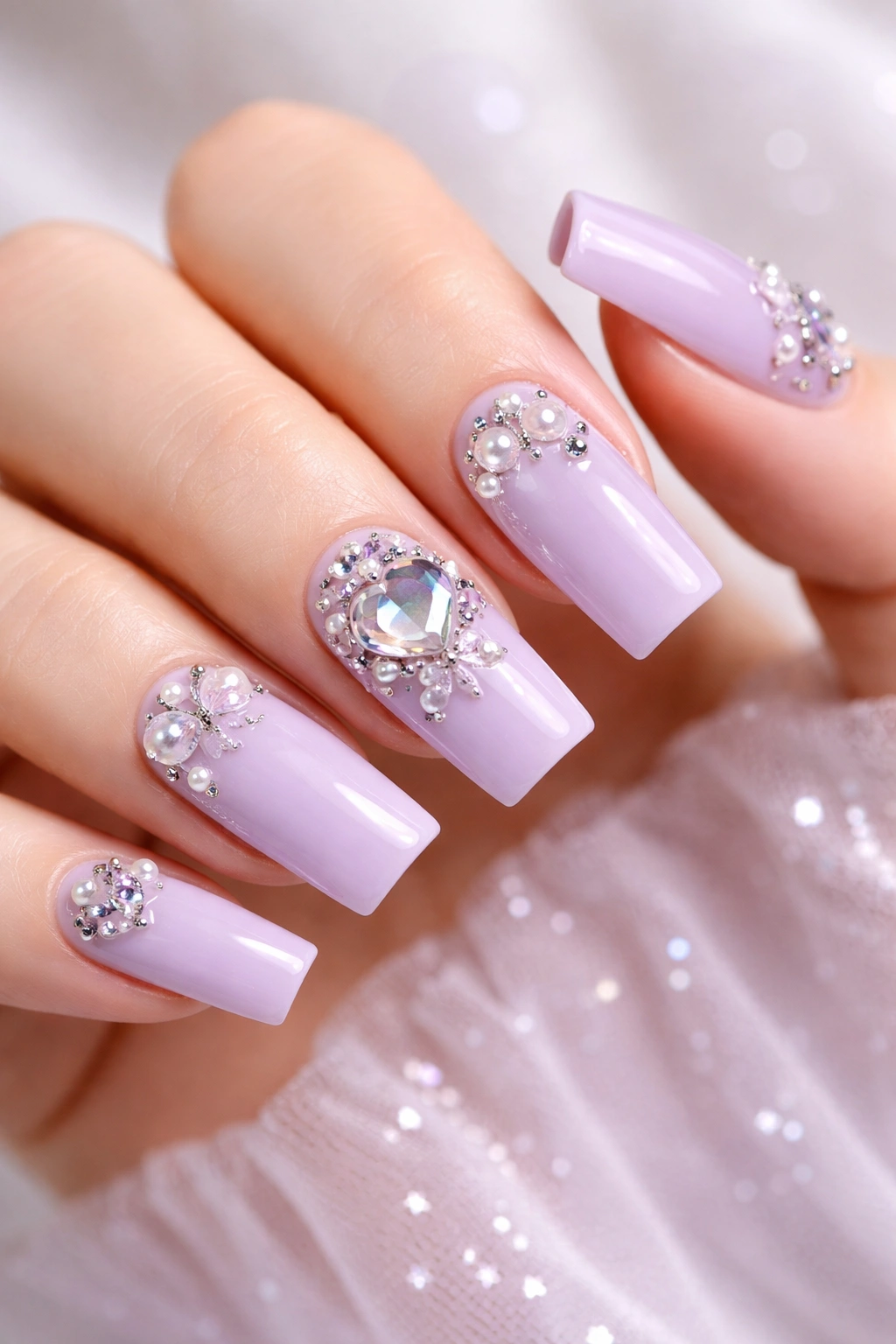 Soft lavender nails with small 3D charms embellishments