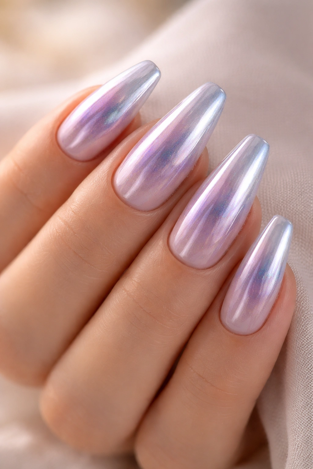 Pale lavender ice chrome ballerina nails with violet blue reflections