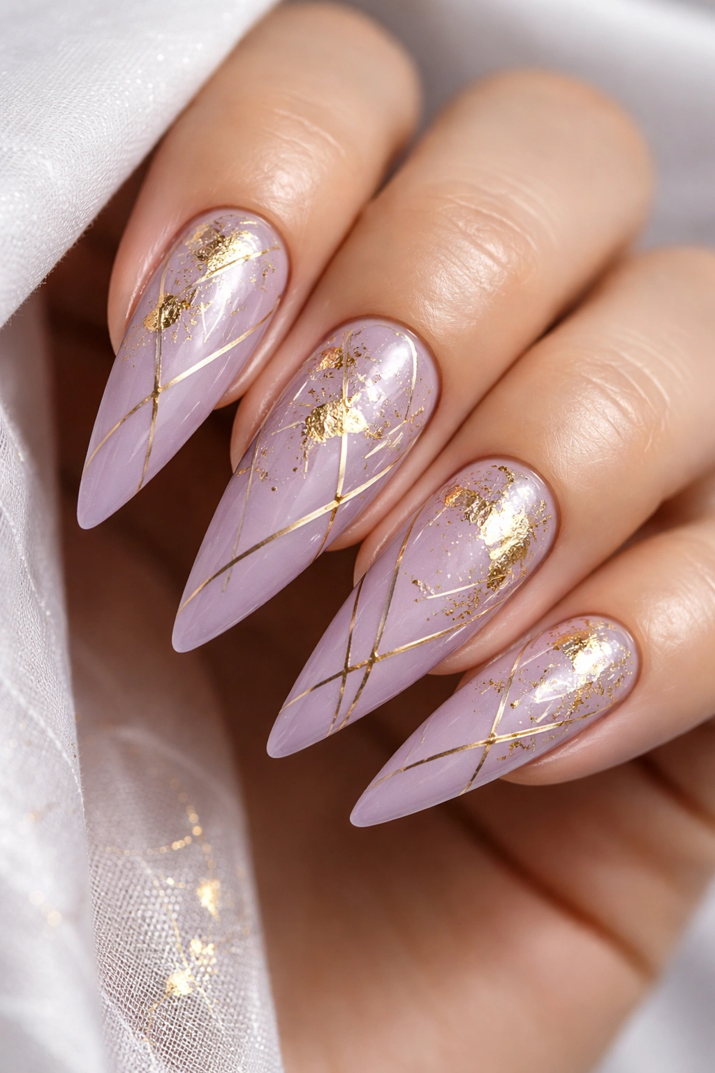 Lavender nails with gold foil and geometric lines