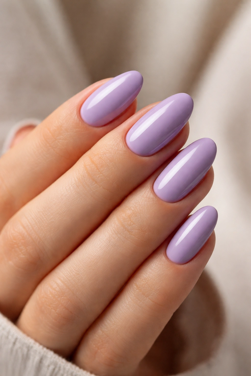 Close-up of lavender almond nails on short nails.