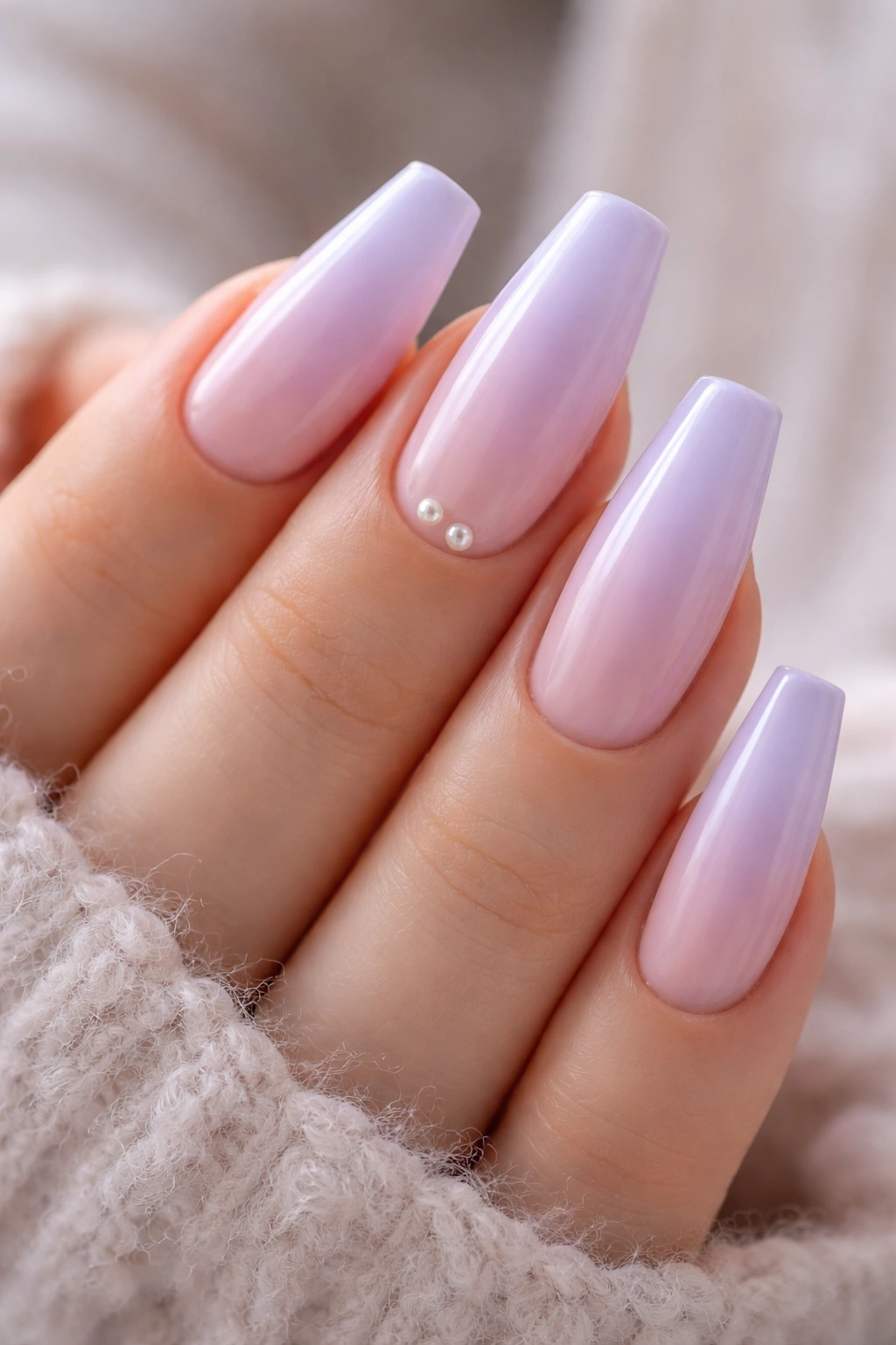 Lavender aura nails with tiny pearls on accent nails