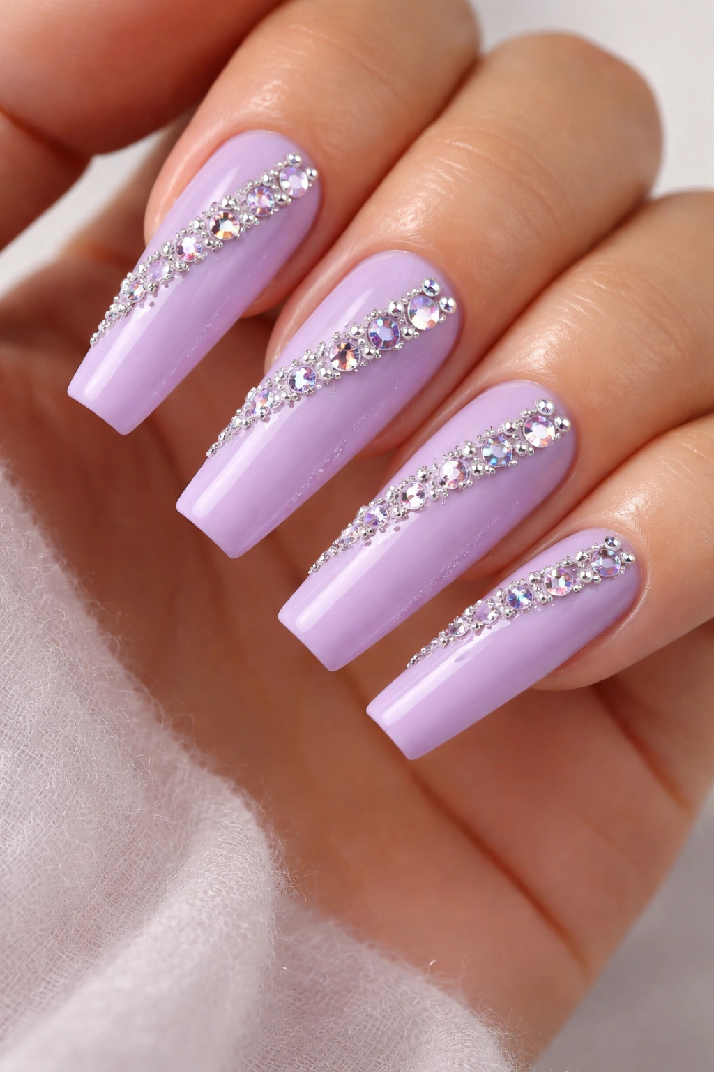 Lavender coffin nails with 3D rhinestones and beads in diagonal pattern