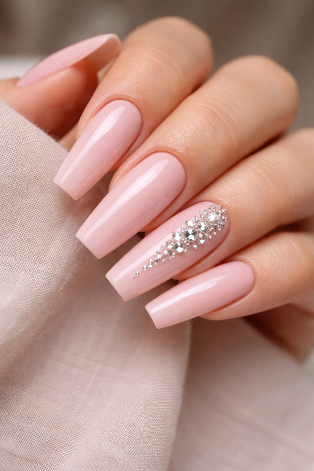 Coffin nails with rhinestones on an accent nail