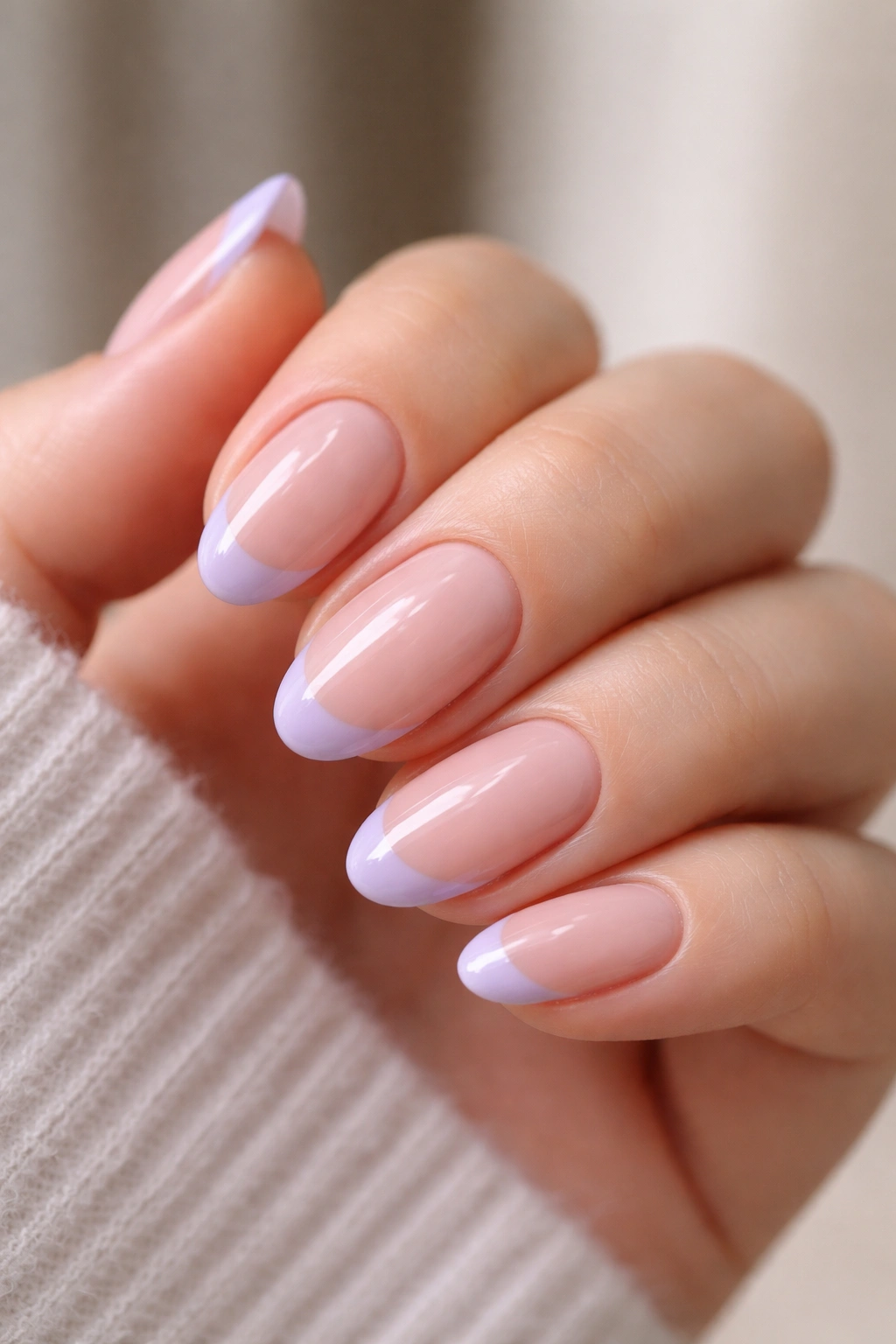 Short almond nails with lilac French tips on sheer pink base