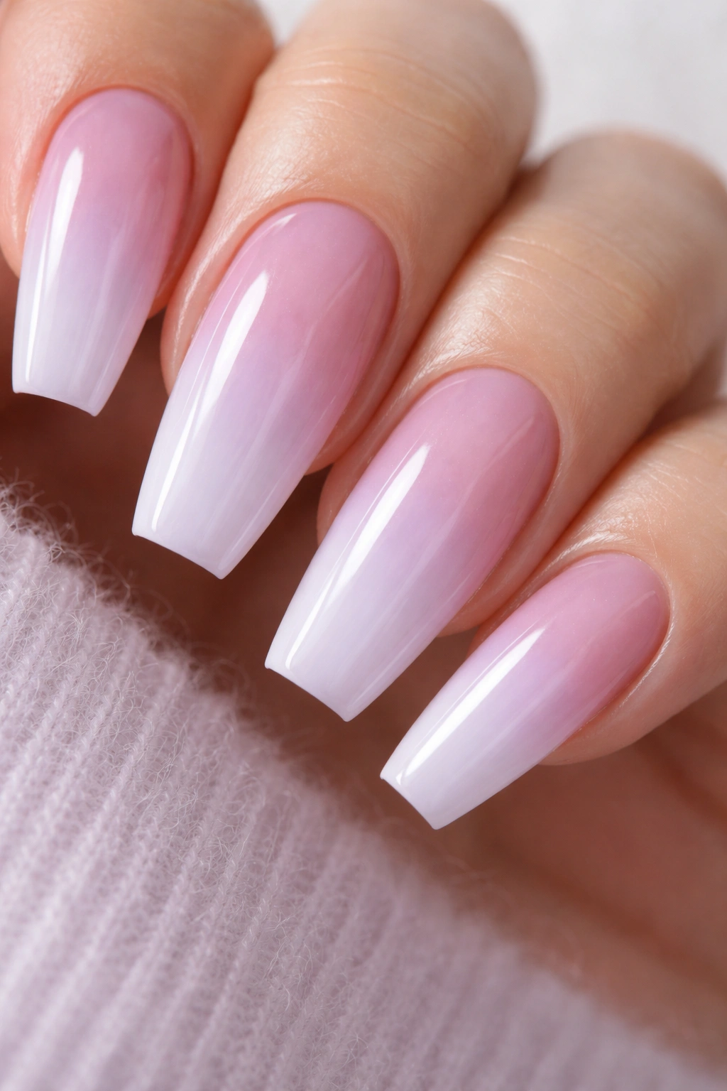 Lilac haze to milky lavender ombre on tapered ballerina nails with clear leveling layer
