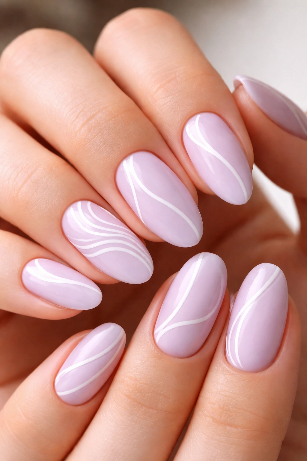 Lilac and white abstract line nails on short almond nails with negative space