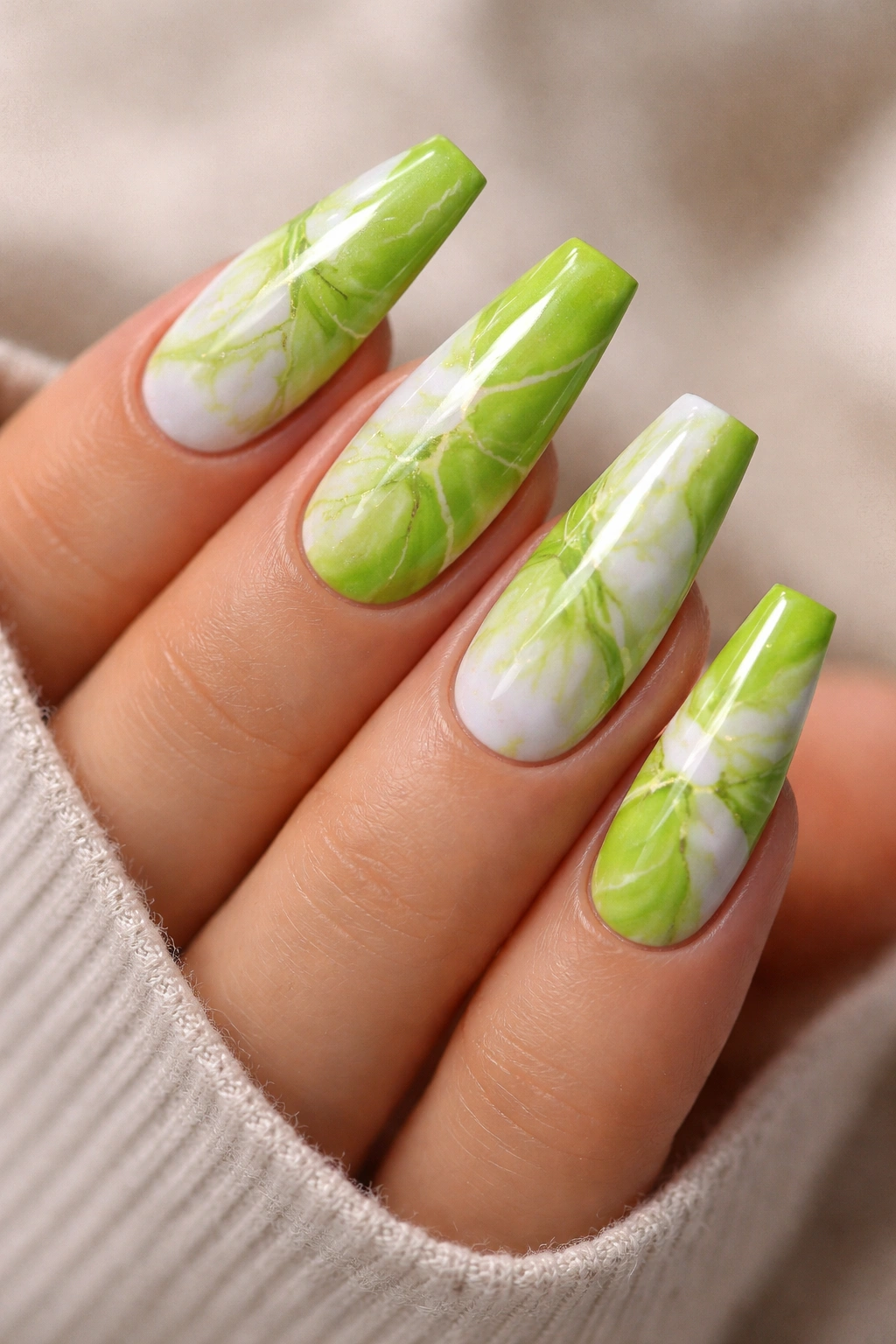 Lime green and white marble coffin nails close-up