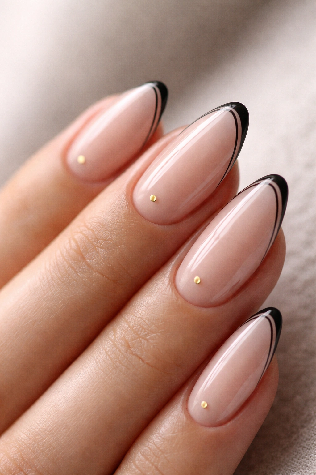 Almond nails with minimal line art: line near edge and dot