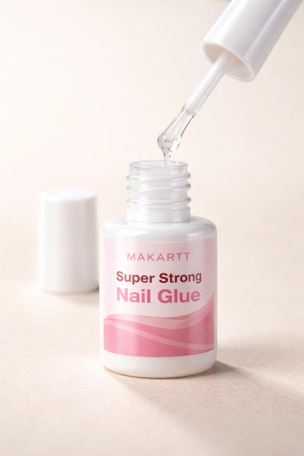 Makartt super strong nail glue bottle close-up with large brush