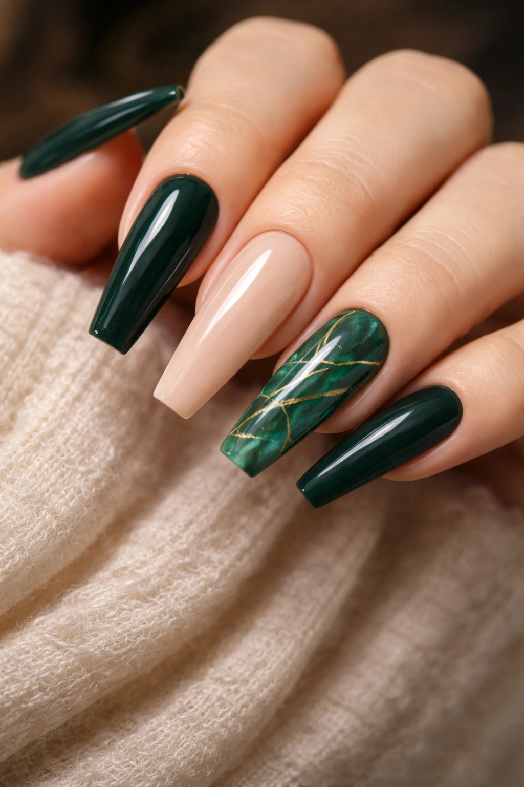 Malachite green marble nails with delicate gold mapping on accent nails