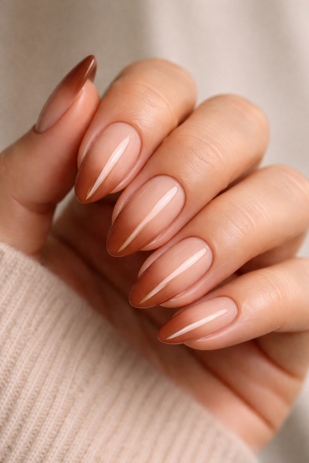 Almond nails with maple brown French and soft ombre base