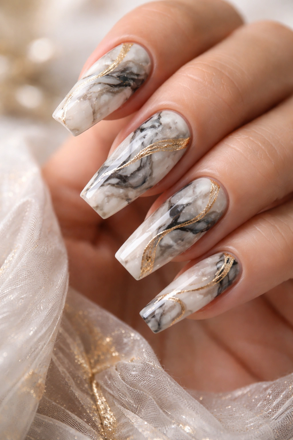 Coffin nails with black and grey marble and gold swirls