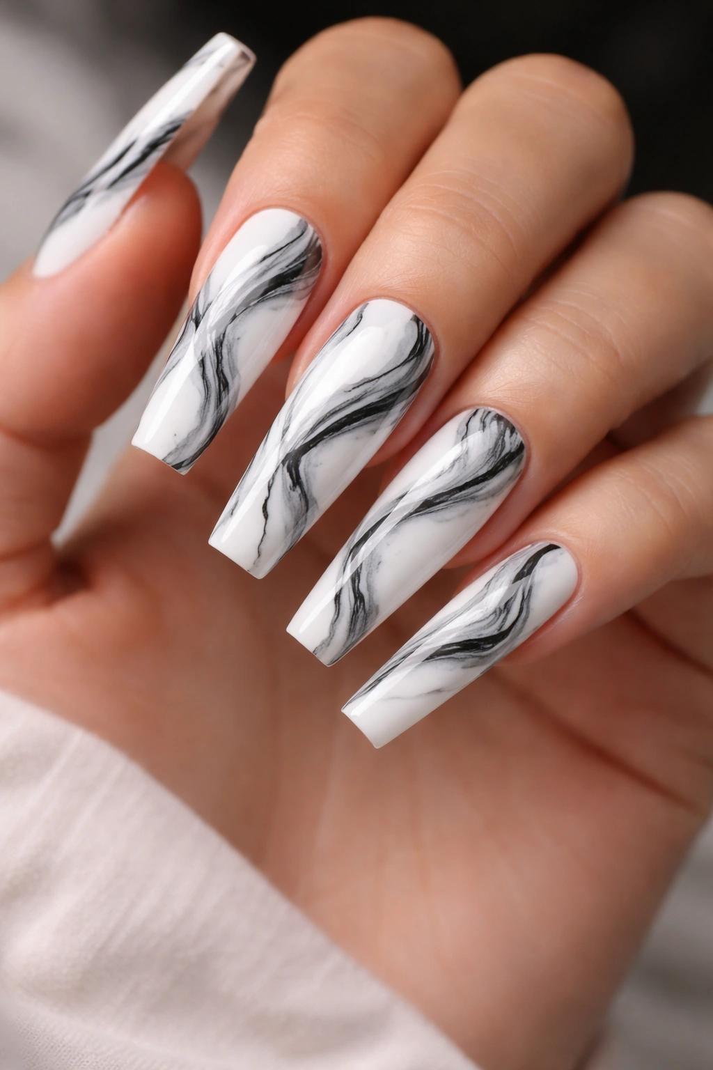 White and black marble coffin nails with swirling veining