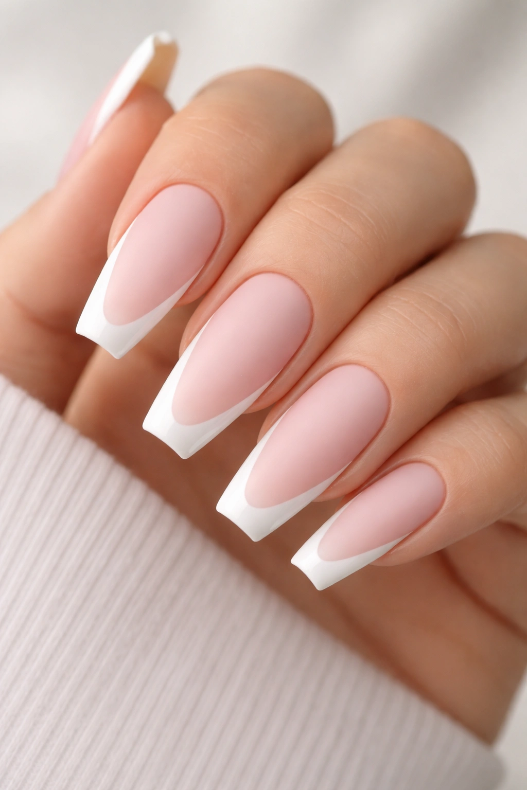 Matte pink nails with gloss white side tips on ballerina shape