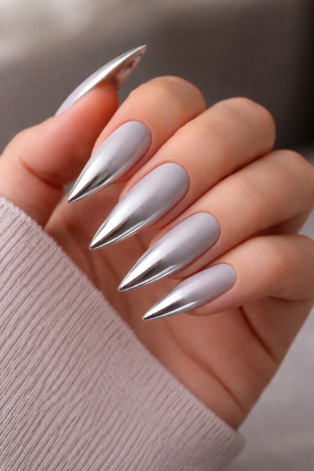 Stiletto nails with matte silver base and glossy tips reverse ombré