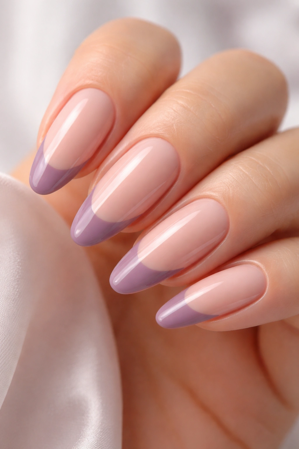 Nails with mauve French tips on nude base