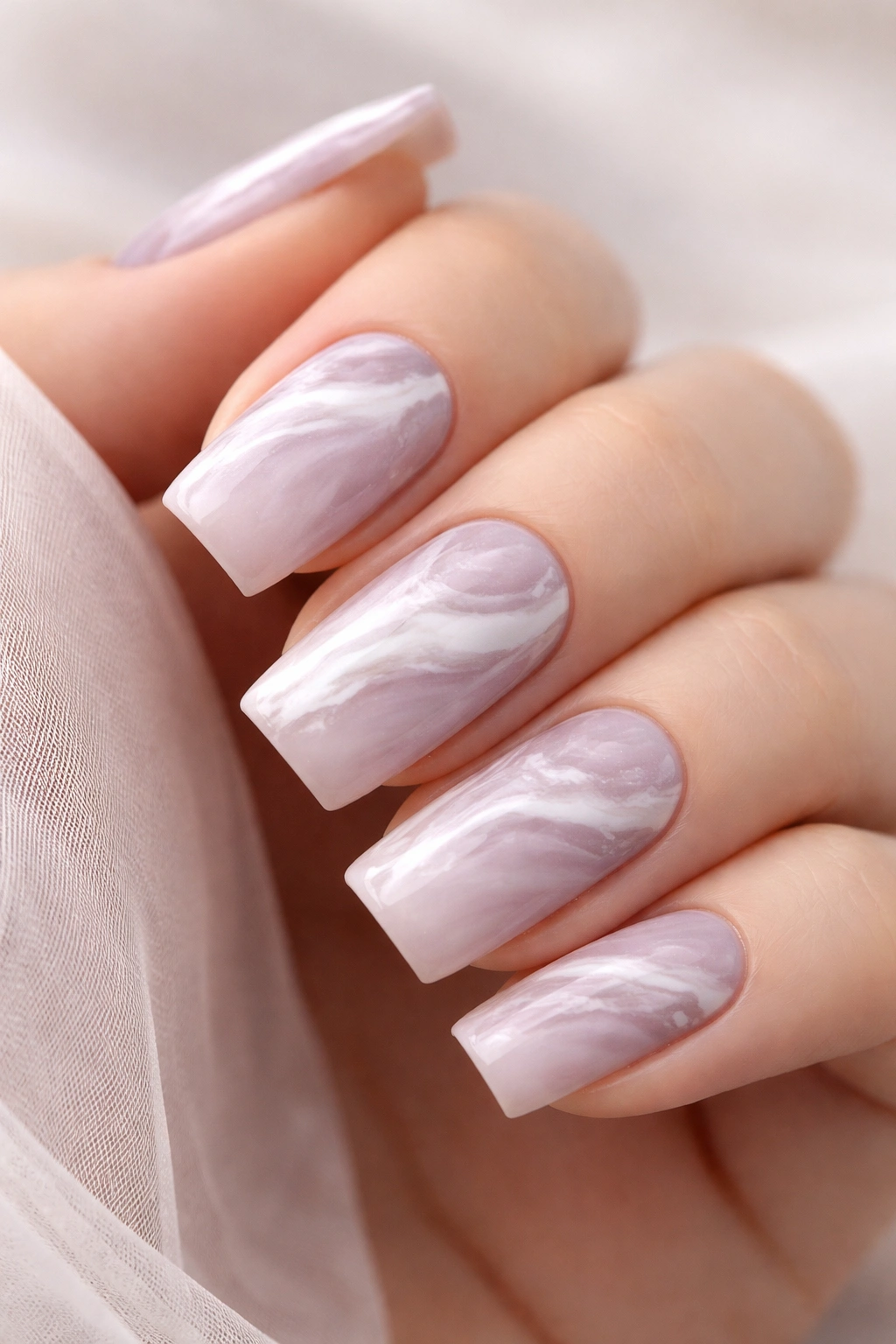 Mauve marble nails with white and gray veining on soft square nails