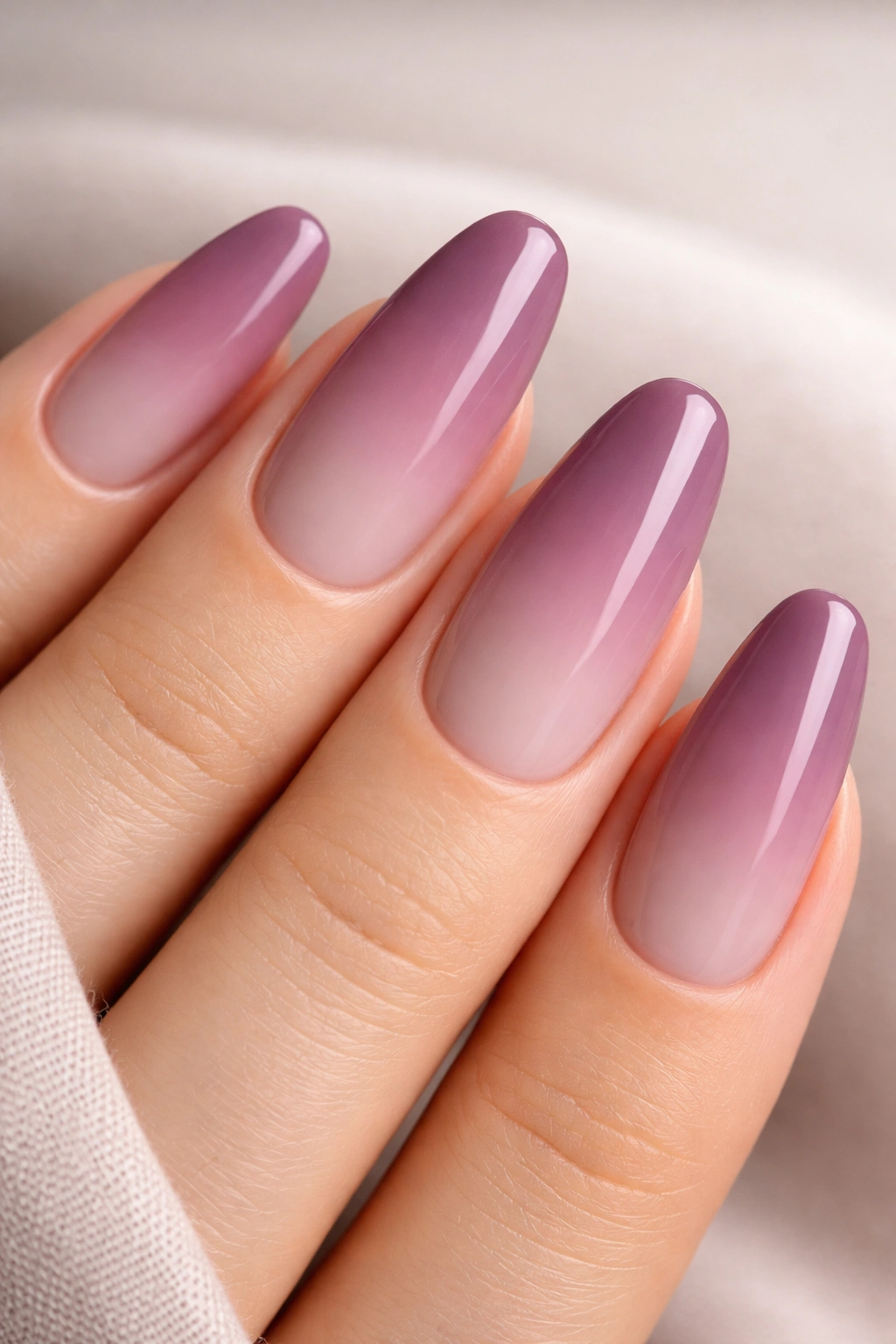 Mauve ombre nails with gradient from dark to light